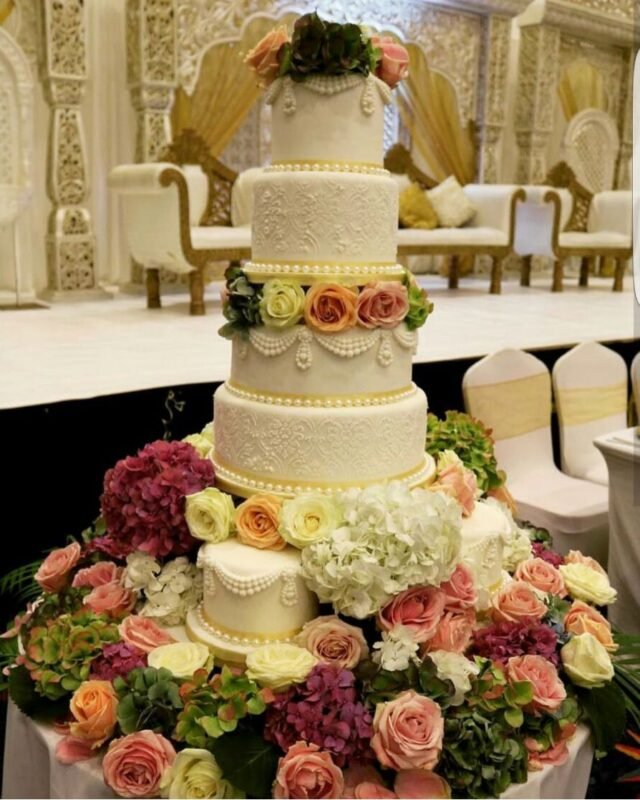 Fresh flower multiple wedding cakes